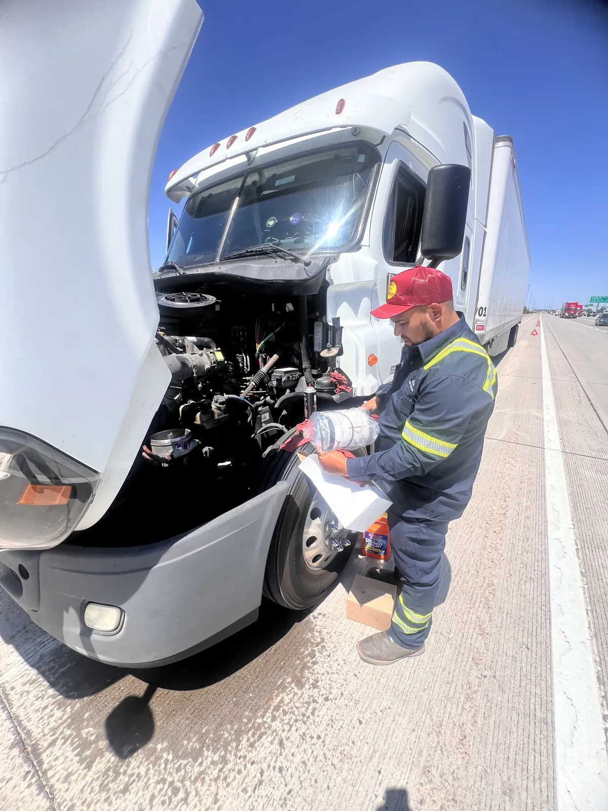 Mobile semi truck repair on the highway shoulder near Tucson, I-10